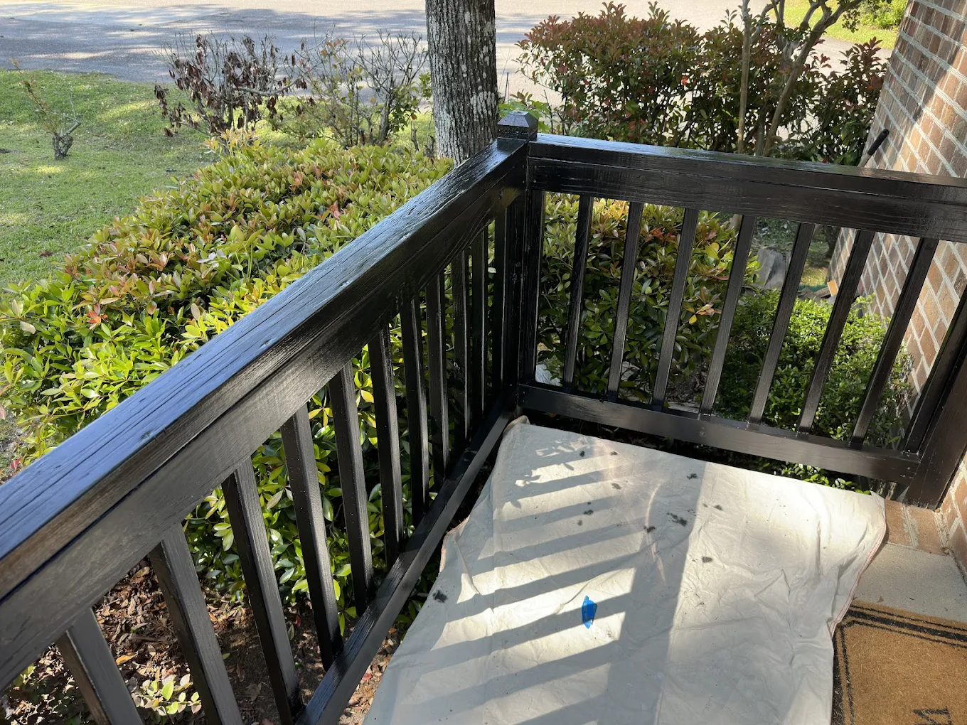 Home Exterior Painting Job in Conway - This exterior painting project in Conway focused on revitalizing wood railings and trim. Proper prep, sealing, and durable coatings were used to restore appearance and protect against weather exposure, resulting in a clean, uniform finish built to last.